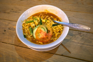 Bakmi Godhog, Indonesian traditional street food, boiled noodles cooked with spices typical of...