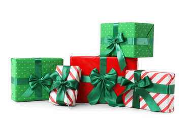 Beautiful Christmas gift boxes with green ribbons on white background