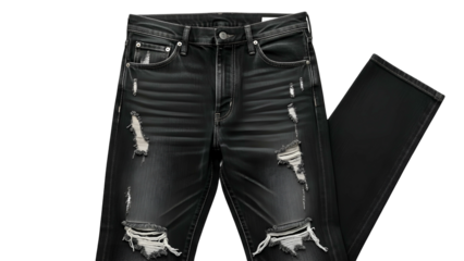 Faded black denim trousers featuring intentional rips and distressing displayed against a dark background