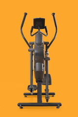 Modern elliptical machine on yellow background