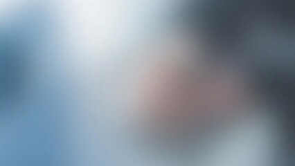 Abstract blurry background with soft pastel hues and subtle textural elements