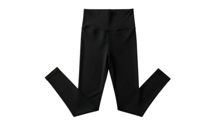 Close up of plain black athletic tights laid flat against a dark background