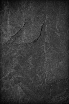 Dark grey black slate background or texture.