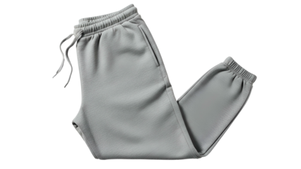 Soft gray athletic bottoms folded with drawstring waist detail presented against a dark background
