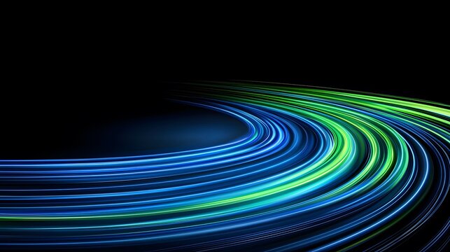 The image shows curved, vibrant light trails of blue and green against a dark backdrop, resembling motion or energy flow in an artistic representation.
