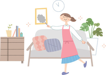 リビングの掃除をする女性