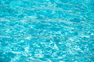 Pool water background, blue wave abstract or rippled water texture background.