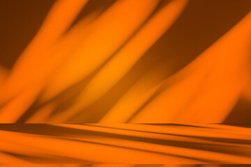 Wall interior background, studio and backdrops show products.with shadow from window color orange background for text insertion and presentation product	
