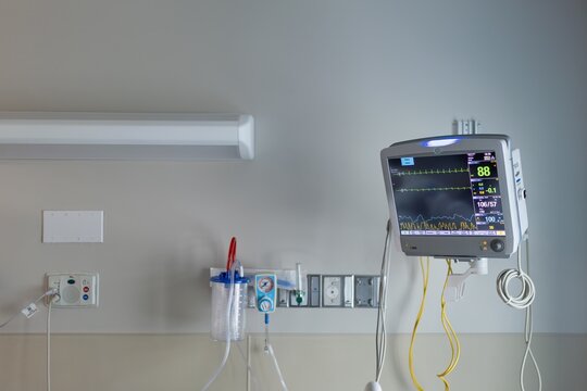 Hospital room with medical monitor showing vital signs, Florida, USA - Powered by Adobe