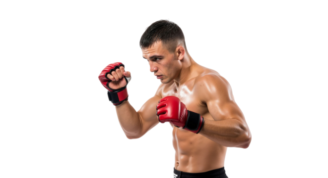 Determined mixed martial arts fighter in offensive stance isolated