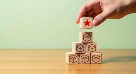 A hand places a wooden block with a red star on a pyramid, symbolizing top quality, leadership, and success