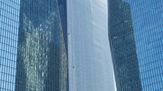 Window Cleaners Working on High-Rise Glass Building in the City, Seoul, Korea
