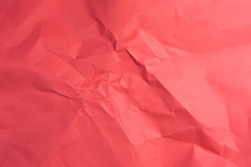 Red recycled paper texture as background, Red crumpled paper texture, Rectangular crumpled red paper sheet.