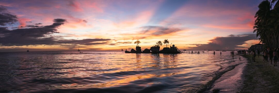 Panoramic of Willy's rock and ocean at sunset, Boracay, Philippines