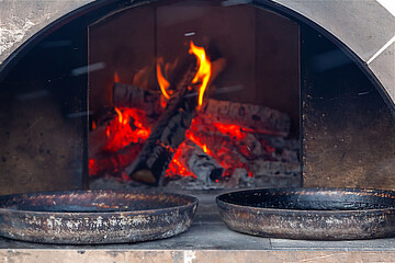 Cooking Flatbreads in a Russian Oven with Firewood