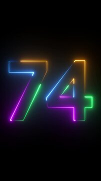 Neon glowing text 74 number animation on black background.74 number neon bright blue red and orrange color.Shining green neon number seventy four animation.