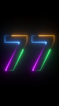 Neon glowing text 77 number animation on black background.77 number neon bright blue red and orrange color.Shining green neon number seventy seven animation.