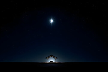 A nativity scene featuring an empty manger illuminated by a single bright star above