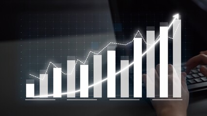 A modern office scene showcases a business growth chart with gradient bars and a trend line, symbolizing positive financial progress and strategic planning. Copula