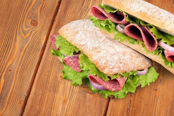 Tasty fresh big sandwich with ham, and vegetables
