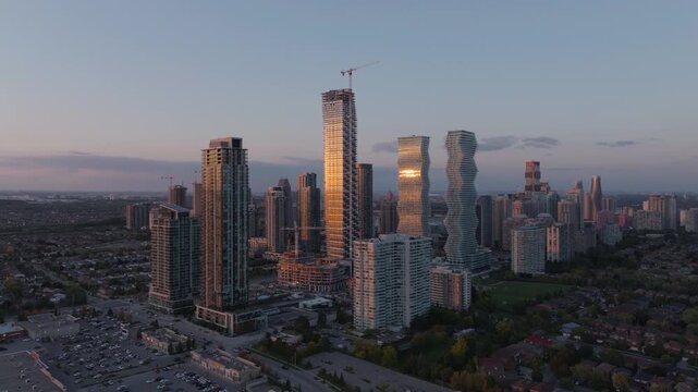 Drone view of Mississauga skyline at sunset with modern condos