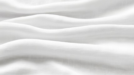 Fototapeta premium Soft white fabric creating gentle waves with smooth texture in natural light