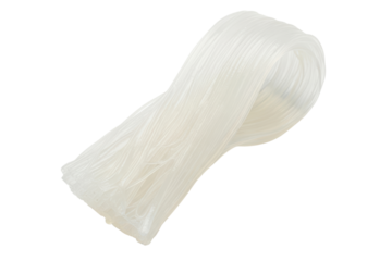 Uncooked translucent asian rice glass noodles ingredient isolated on transparent background