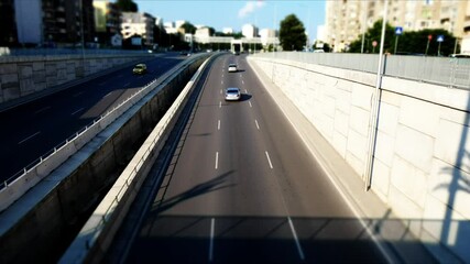 Short daytime time-lapse showing busy transport traffic on Levski Boulevard in Varna filmed from a tripod above the road, Varna, Bulgaria, 08 June 2021