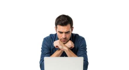 Pensive man working on laptop, deep in thought with crossed arms