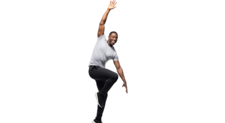 Energetic man in dynamic pose with raised arm against isolated backdrop