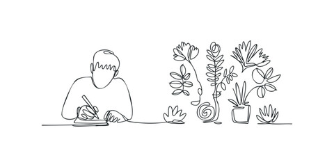 Obraz premium Person writing at desk with potted plants