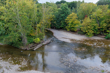 Autumn River Bend with Changing Foliage