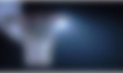 Abstract blue and white light streaks on dark background