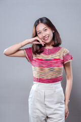 Smiling Asian Woman with Confident and Cheerful Expression