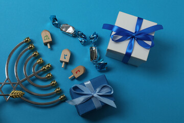 Hanukkah Jewish holiday toys on blue background
