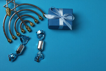 Hanukkah Jewish holiday toys on blue background

