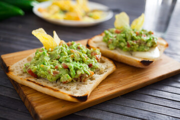morning toast with melted cheese and guacamole