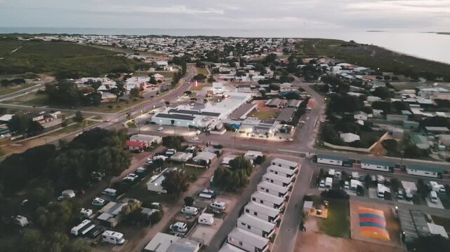 Aerial footage advancing from he Jurien Bay Tourist Park to the rest of the town, which the Indian Ocean Drive cuts across.