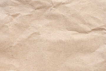 Abstract crumpled and creased recycle brown paper texture background