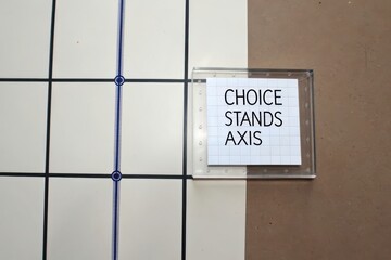 Transparent tile with Choice Stands Axis text placed on a grid