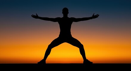 Silhouette of a person with arms outstretched against a sunset background