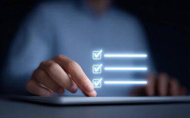 Focused businessman uses data driven hr management for workforce planning. Completing digital checklist for evaluation and recruitment, showing concept of efficiency