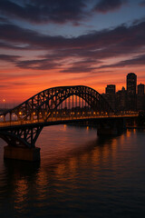 Naklejka premium Steel arch bridge over river at sunset twilight with city skyline in the background 