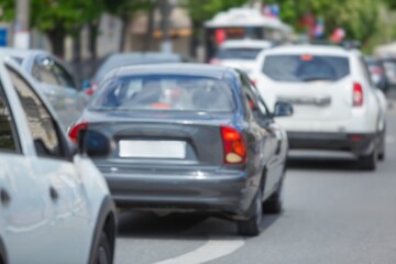 Background blurred focus. Traffic on highway in city
