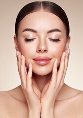 Portrait beautiful young woman with clean fresh skin. Model with healthy skin, close up portrait....