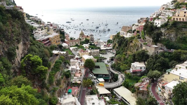 Exploring the beautiful coastal village of Positano Italy showing architecture boats ocean and landscape