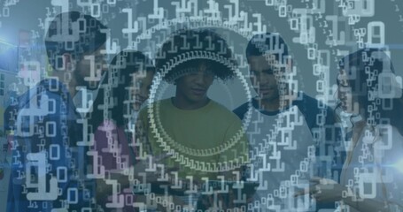 Tech team collaborating over tablets and smartphones in modern office, with binary data overlay