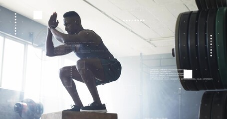 Squatting fit athlete wearing sleeveless top lowering onto plyometric box in gym, with data overlay