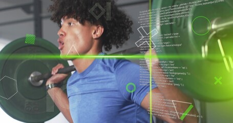 Squatting man in blue athletic shirt holding loaded barbell at gym, with floating code overlays