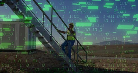 Climbing male wearing hi-vis vest, safety helmet on metal stairs to container cabin at work site